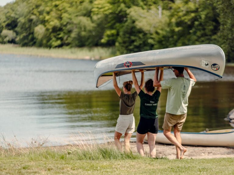 Family in Sweden with a canoe